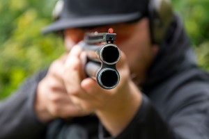 A,Male,Shooter,Aims,A,Sporting,Double-barreled,Hunting,Rifle,,Target
